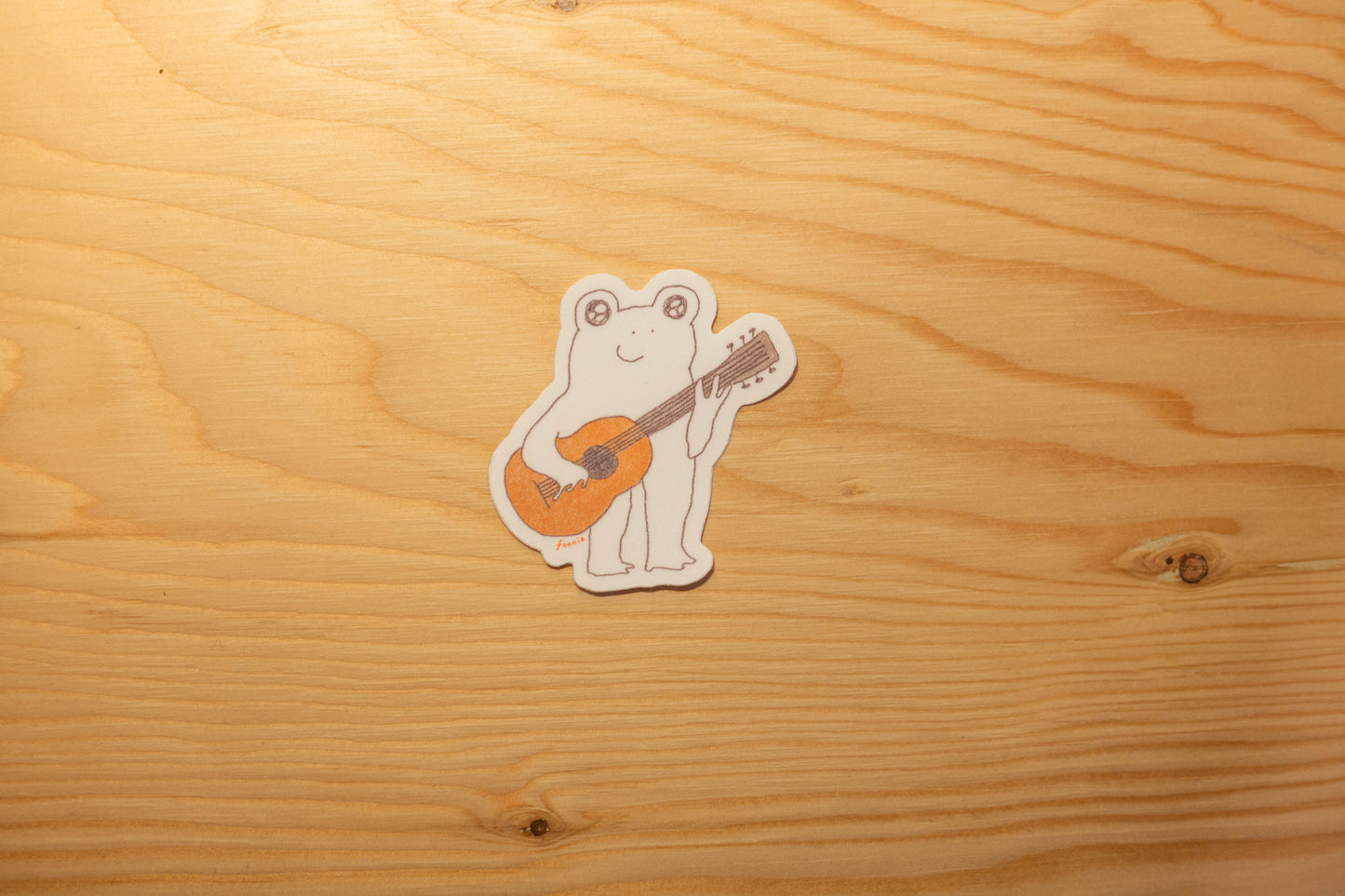 Autocollant grenouille avec guitare