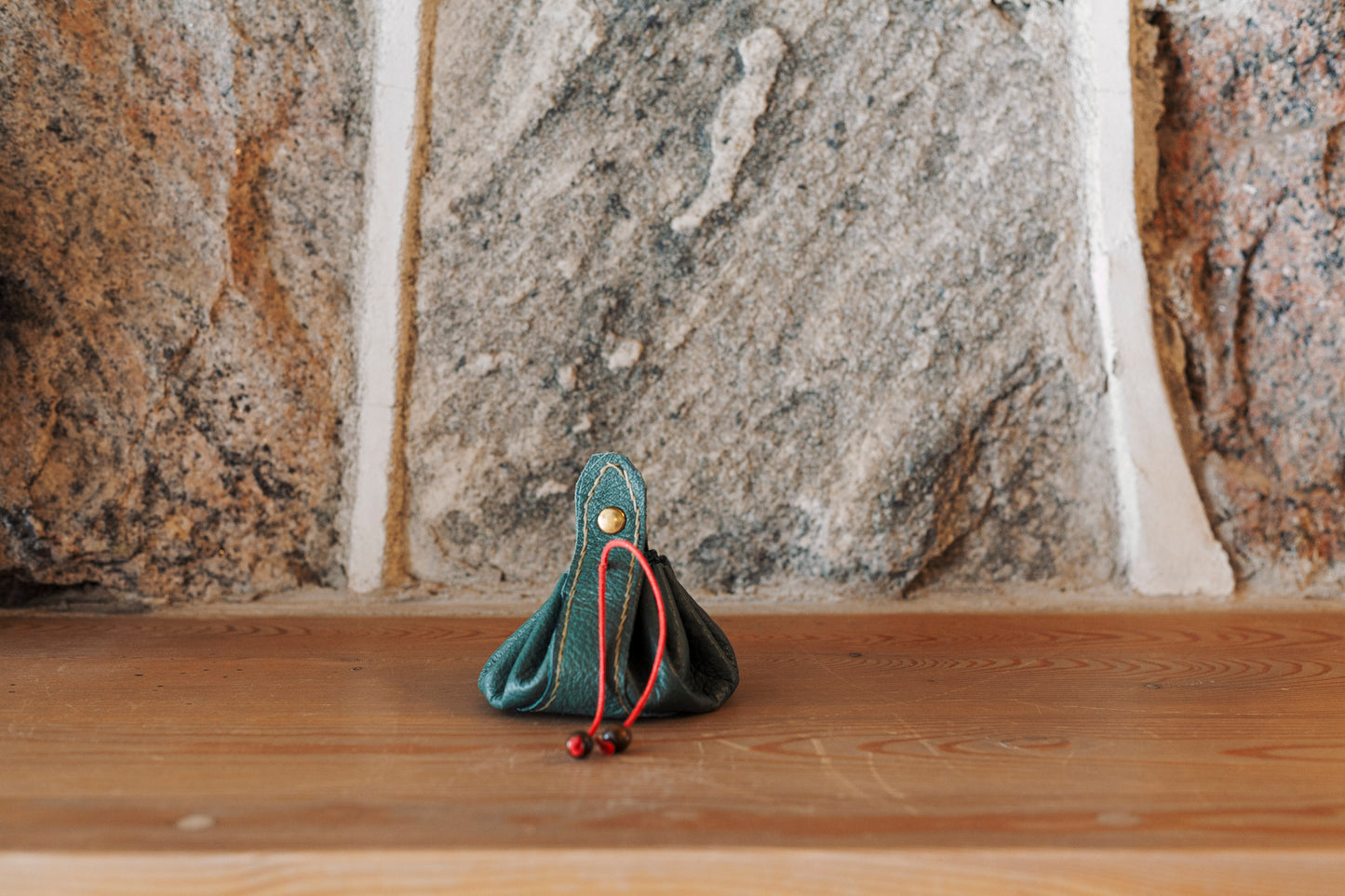 Baluchon en cuir vert