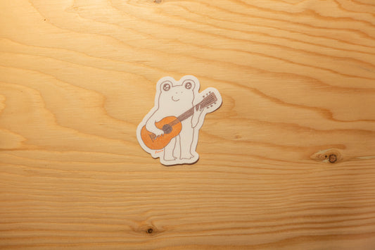 Autocollant grenouille avec guitare